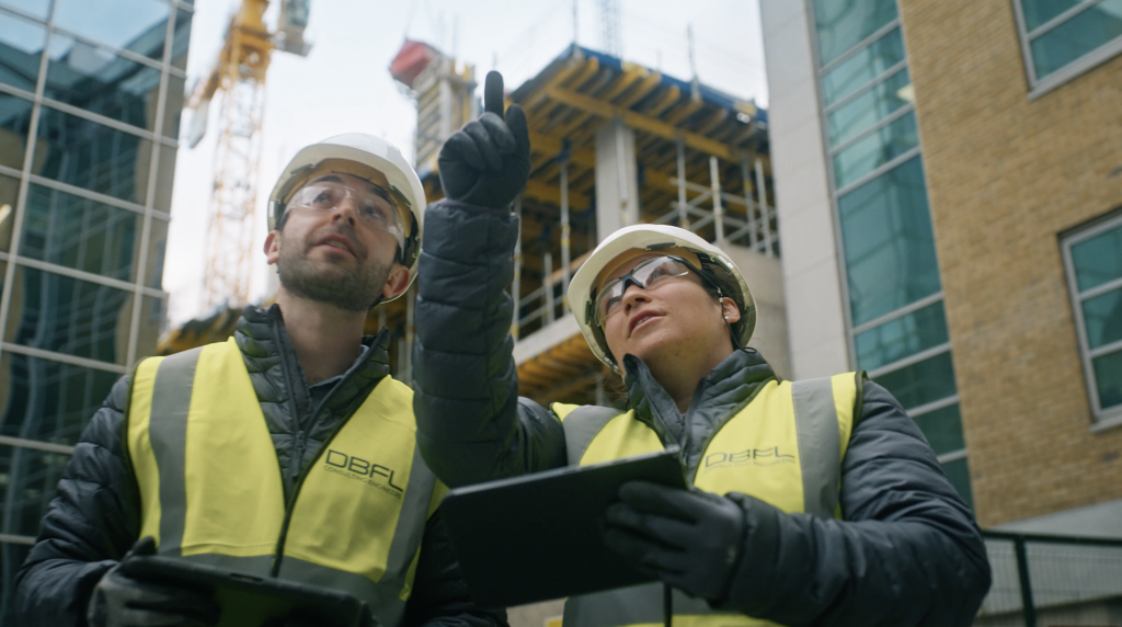Workers overlook a site